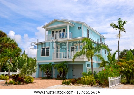A Beautiful Florida House Near the Beach for Rent or Sale. Make a Great Rental Property Royalty-Free Stock Photo #1776556634