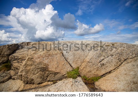 Rocky landscape, summer day, blue sky white clouds, The World's End (Verdens Ende) in Tjøme, Norway