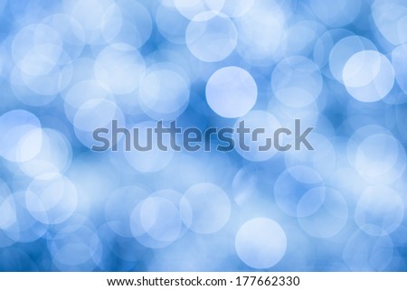 Blue background with bokeh defocused lights, sky colors