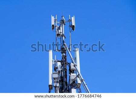 Small Cell 3G, 4G, 5G System. Macro Base Station or Base Transceiver Station. 5G radio network telecommunication equipment with radio modules and smart antennas mounted on a metal.