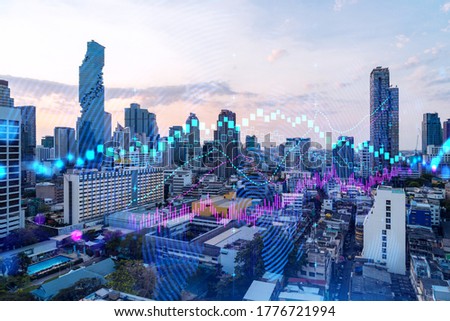 Glowing FOREX graph hologram, aerial panoramic cityscape of Bangkok at sunset. Stock and bond trading in Asia. The concept of fund management. Double exposure. Royalty-Free Stock Photo #1776721994