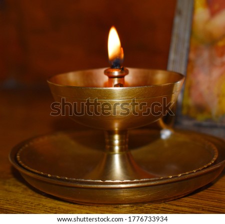 This is a picture of deepa, used to light up with sesame oil,while worshipping hindu gods.