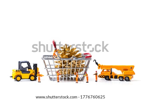 miniature worker passenger Christmas box and pine cone by truck and forklift to shopping basket isolated on white background, image for Christmas holiday and happy new year gift celebration concept.
