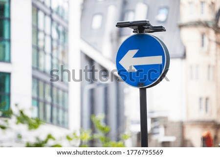 Photo of Arrow sign on street