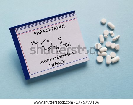 Structural chemical formula of paracetamol molecule with pills and tablets in the background. Paracetamol or acetaminophen is a medication used to treat pain and fever, and it is a mild analgesic. Royalty-Free Stock Photo #1776799136