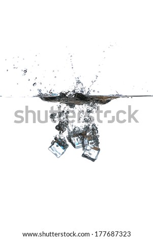 Ice cubes in water on white background