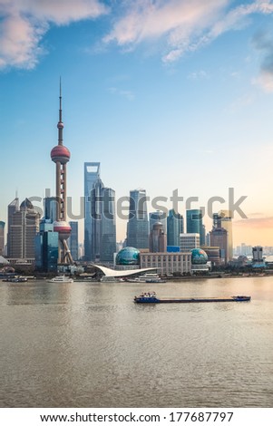 shanghai pudong at dusk,modern building skyline with river 