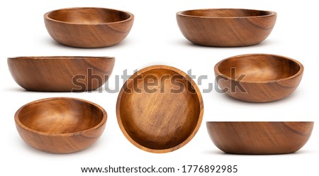Empty wooden bowls isolated on white background. Set of wood bowls. Collection. Royalty-Free Stock Photo #1776892985