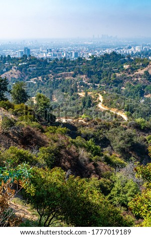 Los Angeles, California. Skyline landscape of the famous urban city from view on mountain/ hills.