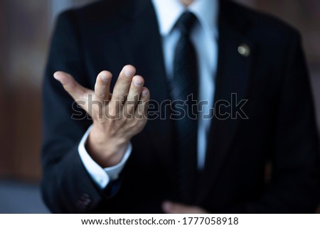 Cropped image of lawyer welcoming hand Royalty-Free Stock Photo #1777058918