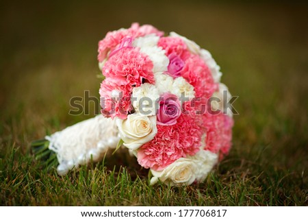 Wedding flowers of pink and white roses and carnation, Bride bouquet at bridal day. Wedding decoration. Soft focus and tonality