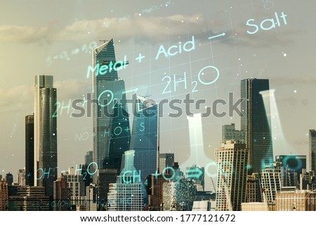 Creative chemistry hologram on Manhattan office buildings background, pharmaceutical research concept. Multiexposure