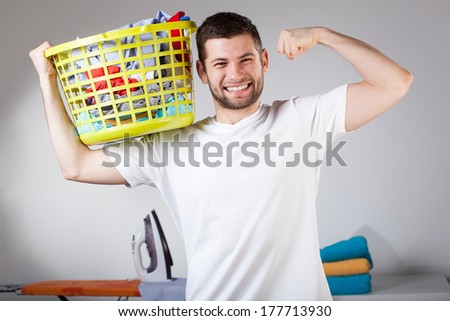 Strong cheerful husband during nice daily duties
