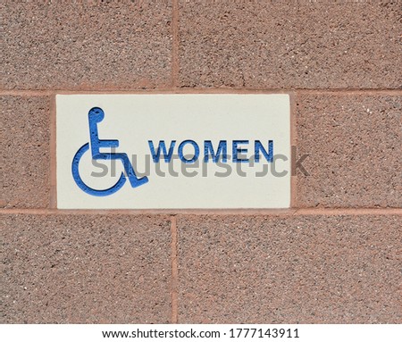 Womens Public Restroom is Handicap Accessible Sign