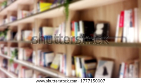 The entire book wall is very unique. backdrop and design element use. Defocused background with bokeh light.backdrop and design element use. Defocused background with bokeh light.