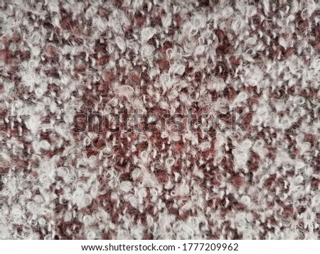 Brown boucle textiles with splashes