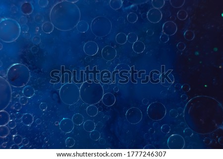 Beautiful abstract blue bubbles background pattern for design. Liquid fluid texture for background, banner.