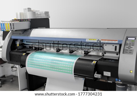 printing equipment and technology concept - large format printer