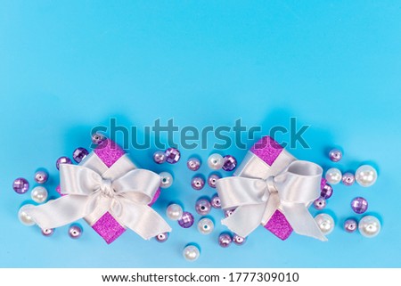 a top view little purple boxes for birthday isolated on the blue background birthday celebration party
