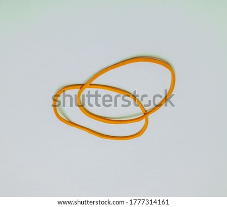 yellow rubber bands isolated on a white background
