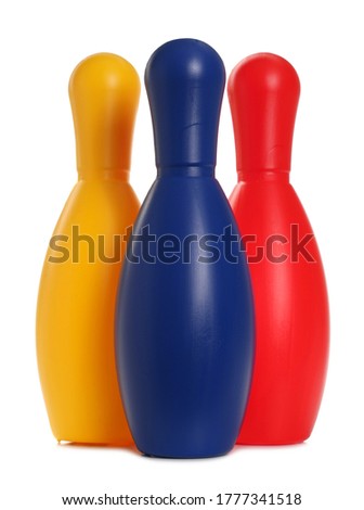 Colorful standing bowling pins, skittles isolated on white background