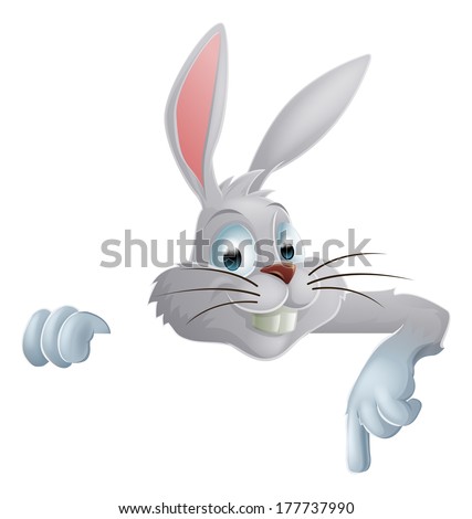 An Easter bunny rabbit pointing down at a banner or sign