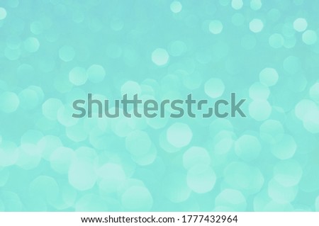 Аquamarine Bokeh Background. Abstract Turquoise Background with Bokeh Effect