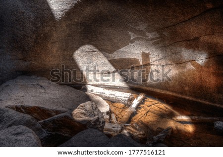 reflection of light creating shadows on a cave wall