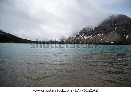 A picture of Bow lake and Bow peak.   
