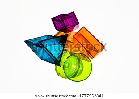 Transparent geometric shapes with shadows. Modern background