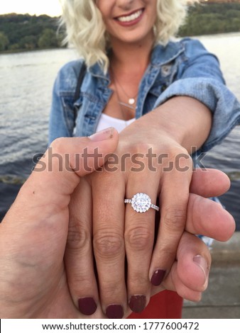 Happy Woman Shows Off Engagement Ring After Proposal  Royalty-Free Stock Photo #1777600472