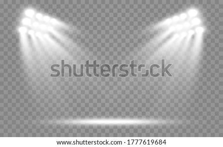 Stadium floodlights brightly illuminate evening or night sports games, concerts, shows, events. Isolated on a transparent background. Arenas of bright spotlights. Bright lights. Illuminated scene. Royalty-Free Stock Photo #1777619684