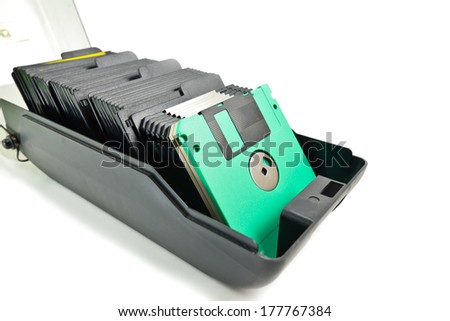 floppy disk in  dirty plastic box