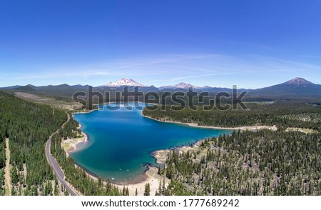 Aerial panorama of Elk Lake and South Sister Peak near Bend, Oregon. Royalty-Free Stock Photo #1777689242