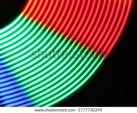 Rounded colorful LED lamp track. Neon light lamp on long exposure shot.
