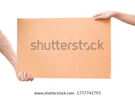 Two hand holding blank brown paper isolated on white background with clipping path