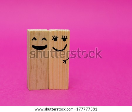 Happy wooden blocks couple 