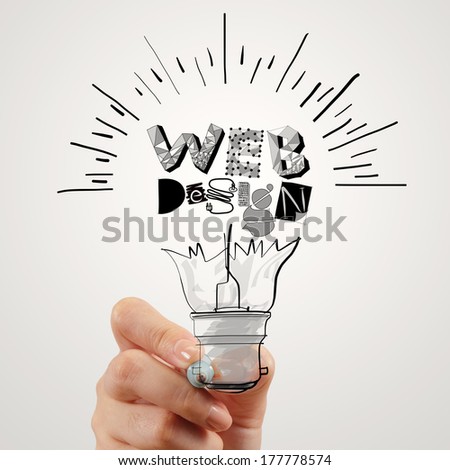 hand drawing light bulb and WEB DESIGN word design as concept