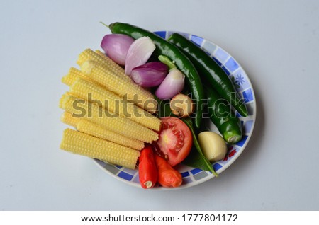 chilli onion corn and tomatto the ingredients for traditional food in Indonesia