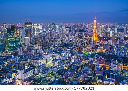 Tokyo, Japan aerial cityscape view of Tokyo Tower at dusk.