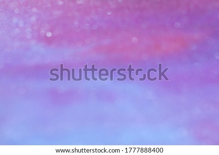 Abstract Background with Bokeh Effect in Blue and Purple Shades