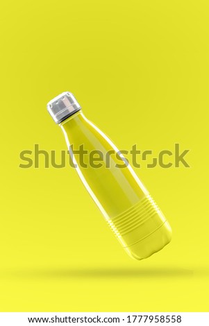 Yellow colored Steel bottle flying in air | fancy bottle | with space for text