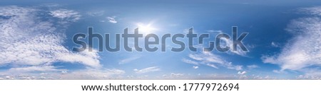 blue clear sky with beautiful fluffy clouds without ground. Seamless hdri panorama 360 degrees angle view without ground for use in 3d graphics or game development as sky dome or edit drone shot