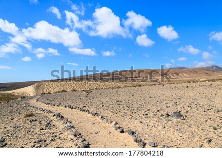 Trekking trail path near Sotavento beach on Jandia peninsula, Fuerteventura, Canary Islands, Spain