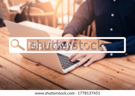 the businessman using a laptop and overlay of the searching bar image