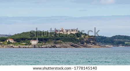 Magdalena Palace in Santander, seen from the other side of the bay. Royalty-Free Stock Photo #1778145140