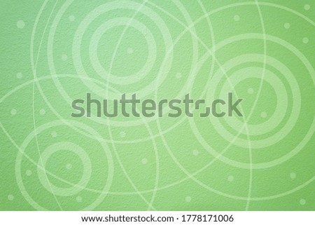 Light green background, many circles pattern.