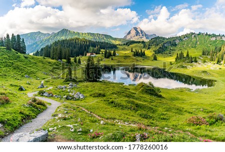 Fantastic hike in the beautiful Lechquellen Mountains - Warth-Schröcken - Bregenzerwald in Vorarlberg Royalty-Free Stock Photo #1778260016