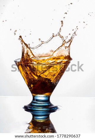 water splash in glasses isolated on white background