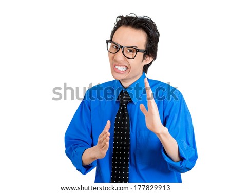 Closeup portrait of angry mad, furious nerdy man raising hands in the air attack with karate chop, isolated white background. Negative emotion facial expression feelings, body language, signs, symbols